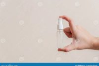 light-skinned-asian-woman-holding-hand-sanitizer-spray-bottle-shows-hygiene-cleanliness-virus-bacterial-spread-186829171 Japanese hand sanitizer dispenser aesthetic